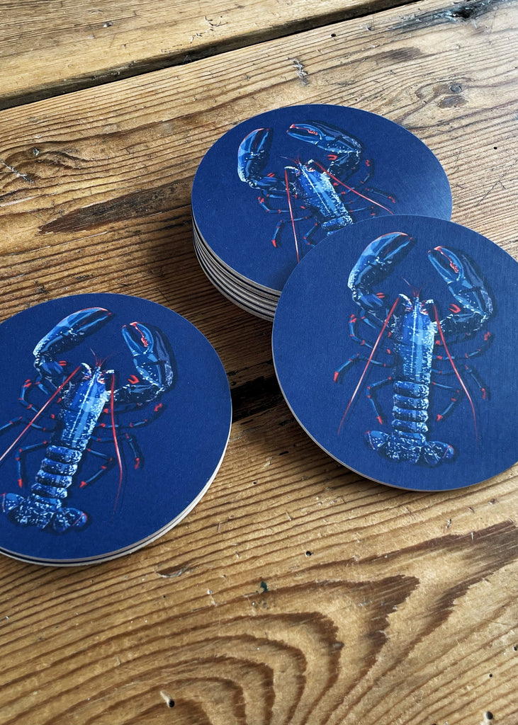 Dessous de verre en bois d'un homard bleu de la marque bretonne Parallèle 48 (fabrication bretonne)