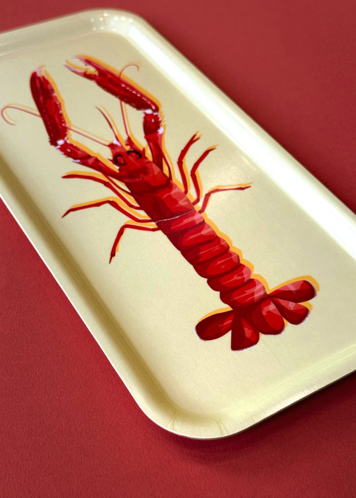 Plateau pour le café avec une illustration de langoustine sur fond jaune