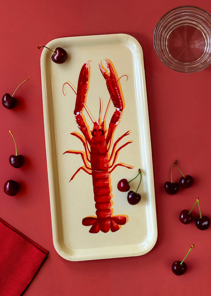 Plateau pour le café avec une illustration de langoustine sur fond jaune