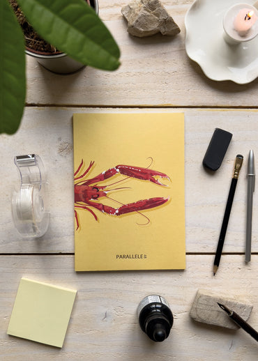 Illustration d'une langoustine imprimée sur un carnet de notes made in France