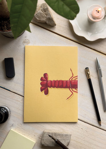 Illustration d'une langoustine imprimée sur un carnet de notes made in France
