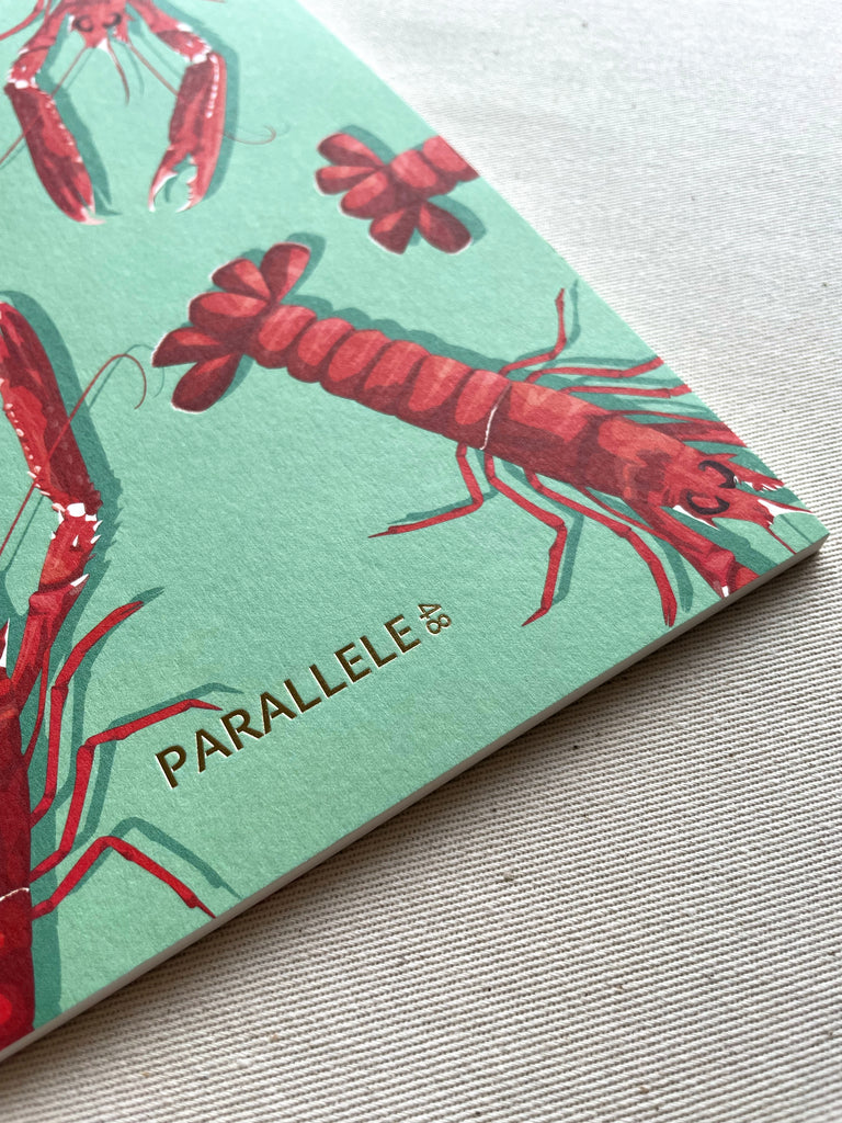 Motifs de langoustines sur un carnet A5 made in France de la marque Parallèle 48
