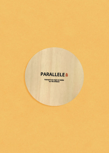 Dessous de verre en bois de bouleau de la marque Parallèle 48 : idéal pour le café ou l'apéro !