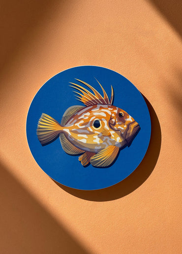 Dessous de plat en bois avec un dessin du saint-pierre