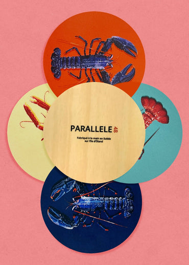 Lot de 4 dessous de verre en bois de crustacés de la marque bretonne Parallèle 48 (fabrication suédoise)