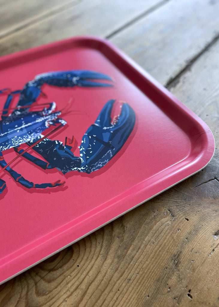 Plateau rectangulaire design français d'un homard sur fond rose