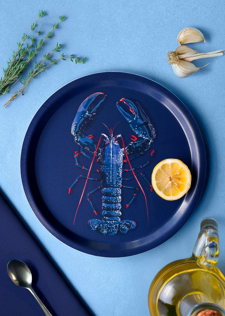 Plateau rond en bouleau d'un homard bleu fabrication suédoise