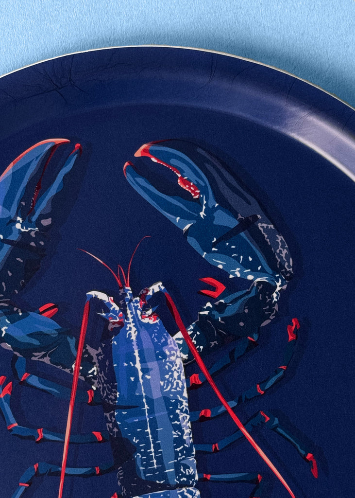 Plateau rond en bouleau d'un homard bleu fabrication suédoise