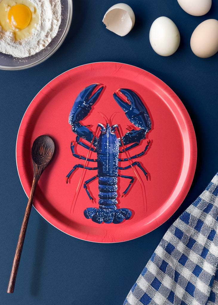 Plateau rond en bouleau d'un homard bleu fabrication suédoise