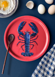 Plateau rond en bouleau d'un homard bleu fabrication suédoise