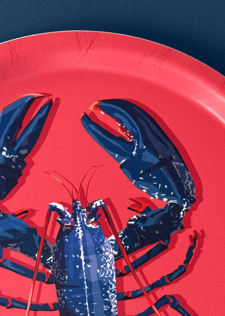 Plateau rond en bouleau d'un homard bleu fabrication suédoise